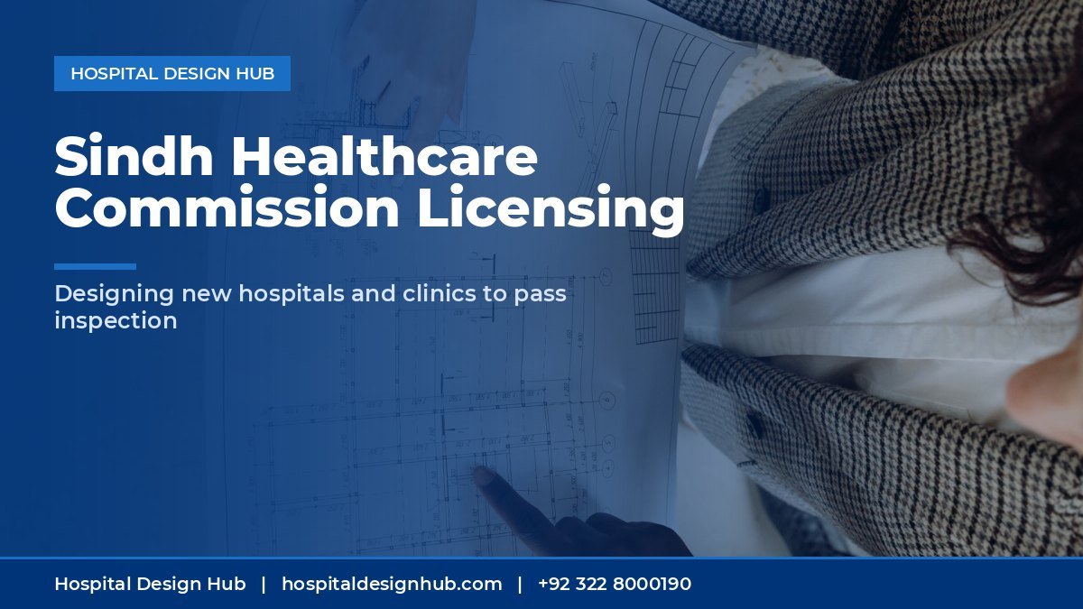 Sindh Healthcare Commission licensing - team reviewing architectural blueprint
